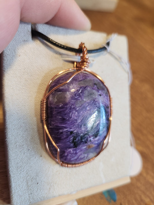 Charoite wrapped in Copper