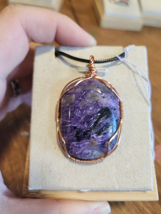 Charoite wrapped in Copper