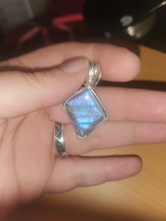 Blue + Purple flash labradorite wrapped in sterling silver