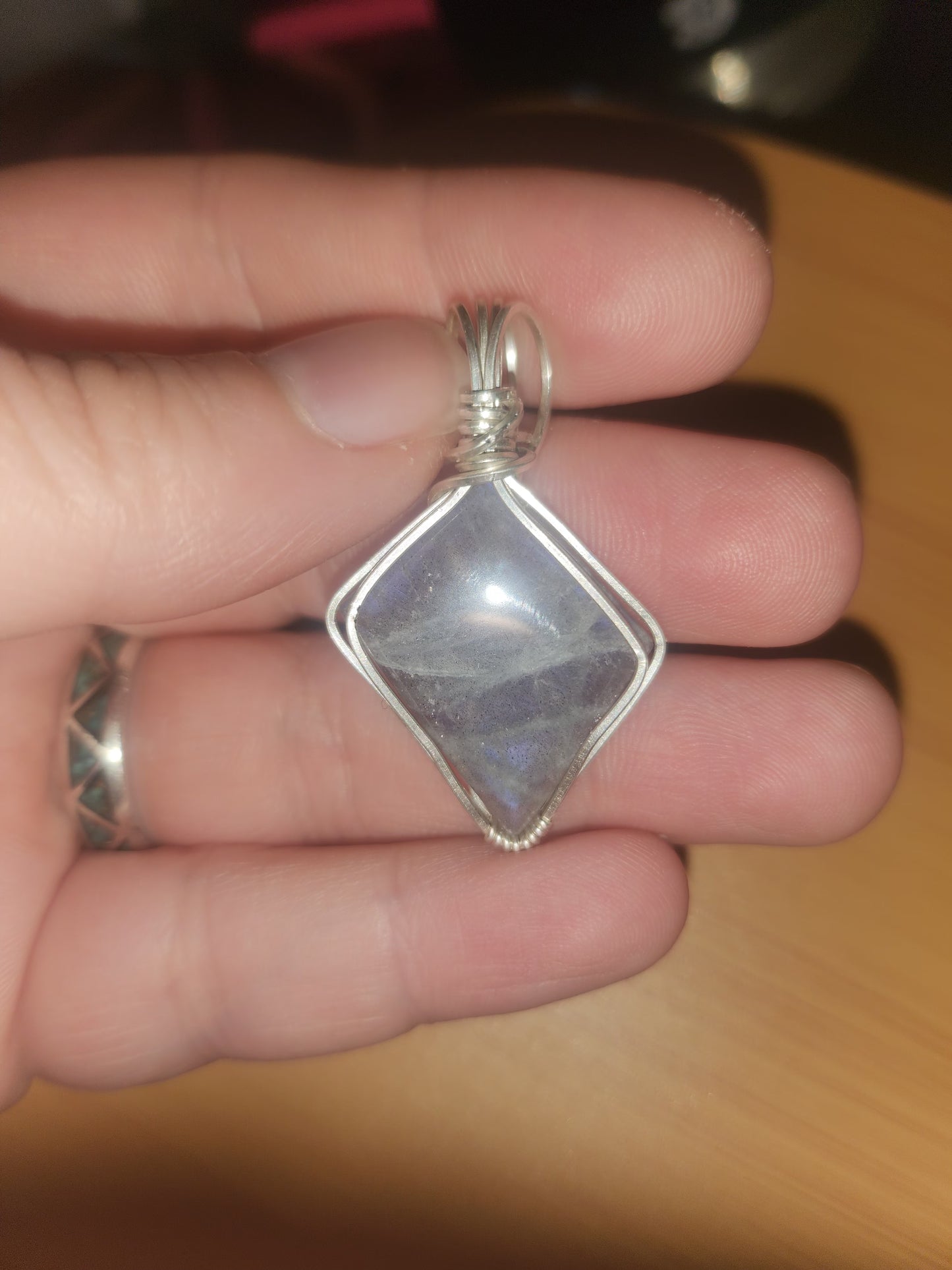 Blue + Purple flash labradorite wrapped in sterling silver